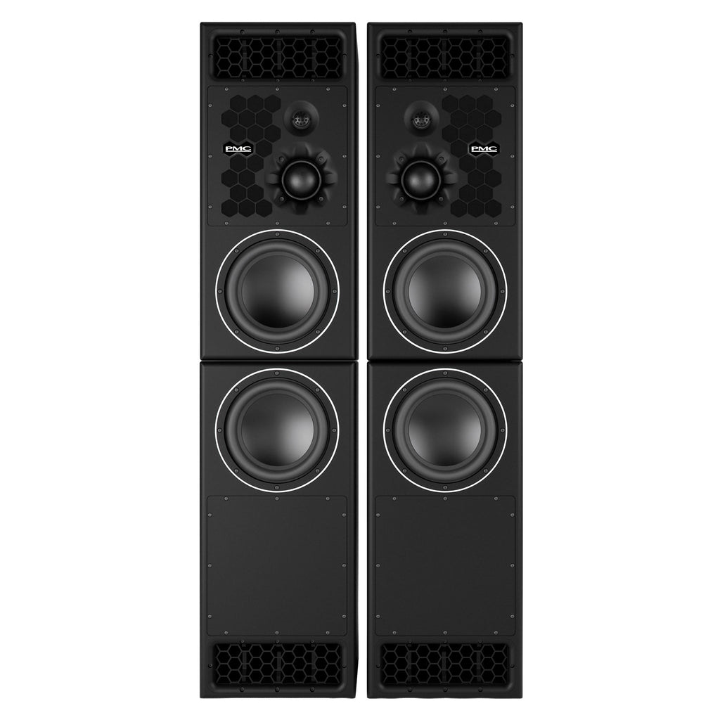 Two matching tall black rectangular PMC studio monitor cabinets shown as a vertical stack; the upper cabinet has three visible drive units (a small dome tweeter, a midrange, and a 10-inch bass driver) with a front PMC logo, and the lower cabinet houses a single 10-inch bass driver.