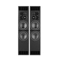A tall rectangular PMC12 XBD active studio monitor cabinet in a matte Studio Black finish, with large low-frequency drivers and smaller soft-dome midrange and tweeter drivers mounted on the front baffle.