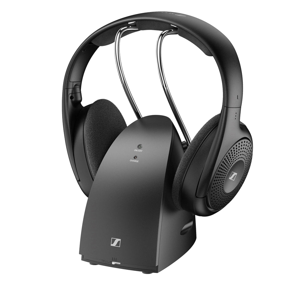 Black wireless headphones resting on a black charging and receiver base with indicator lights