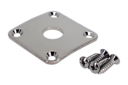 A square chrome metal plate with a central hole and four screws for mounting.