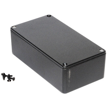 Black rectangular metal enclosure box with four screws beside it on a white background.