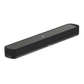 Black rectangular studio monitor speaker with mesh grille and touch controls on top surface.