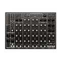 Black electronic drum machine module with multiple knobs, buttons, and jack sockets labeled for various sound and control functions.