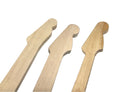 Three pre-shaped guitar neck blanks made of natural maple wood.