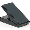 Black expression pedal viewed from an angled side perspective on a white background.