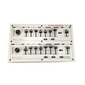 Top view of a white SY-1 drum synthesizer panel with dual control sections and various sliders, knobs, and toggle switches.