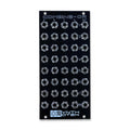 Black Synthrotek Combine-OR eurorack module with multiple 1/8 inch audio jacks arranged in rows and columns.