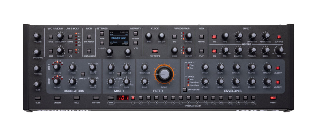 Black synthesizer module with numerous knobs, buttons, switches, and a blue digital display screen on top panel.