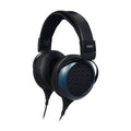 Black and blue over-ear wired headphones with padded headband and ear cups, showing Fostex branding.