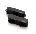 Two black rectangular EMG guitar pickups with white logo on glossy white surface.