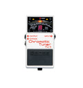 White Boss chromatic tuner pedal with black foot pedal and red indicator lights, showing a tuning display with letter A.