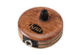 Round wooden piezo pickup with a black control knob and a quarter-inch audio jack connector.