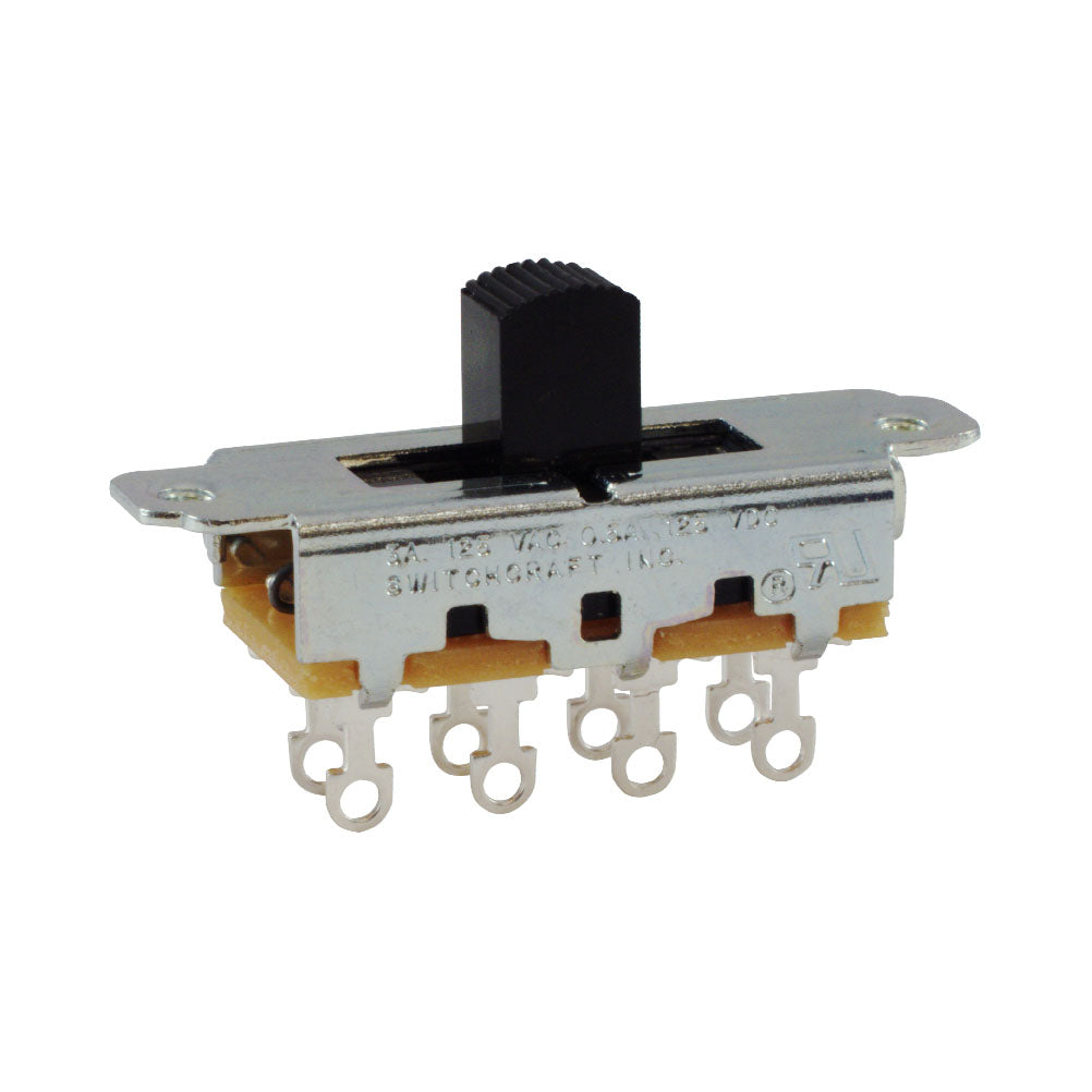 Metal slide switch with black plastic actuator and six solder lug terminals attached to a yellow base.