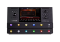 Black rectangular guitar effects floor processor with colorful footswitches and a central touchscreen display.