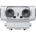 Silver audio device with two black rotary knobs and a toggle switch labeled 0-20 PAD