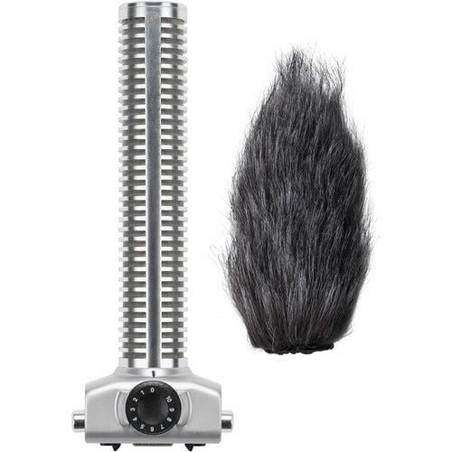 Silver shotgun microphone with a rotary dial and a black furry windscreen next to it on a white background.
